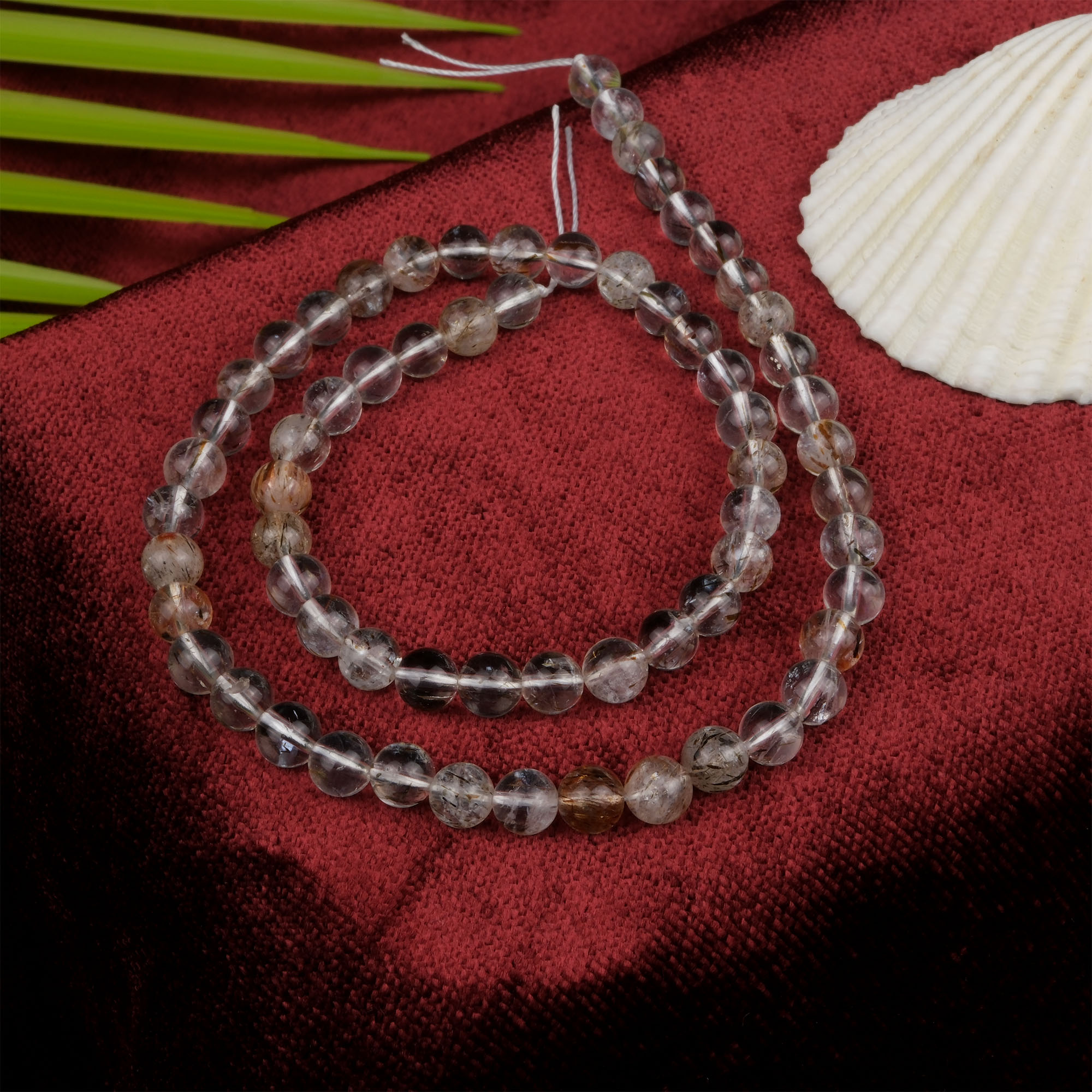 bakir-rutilli-kuvars-dizi-dogal-tas-dizi-6mm-safir-tas-evi (2) Bakır Rutilli Kuvars doğal taş dizi 6 mm – içindeki bakır rutil kristalleriyle enerji akışını hızlandıran, denge sağlayan toptan doğal taş dizi