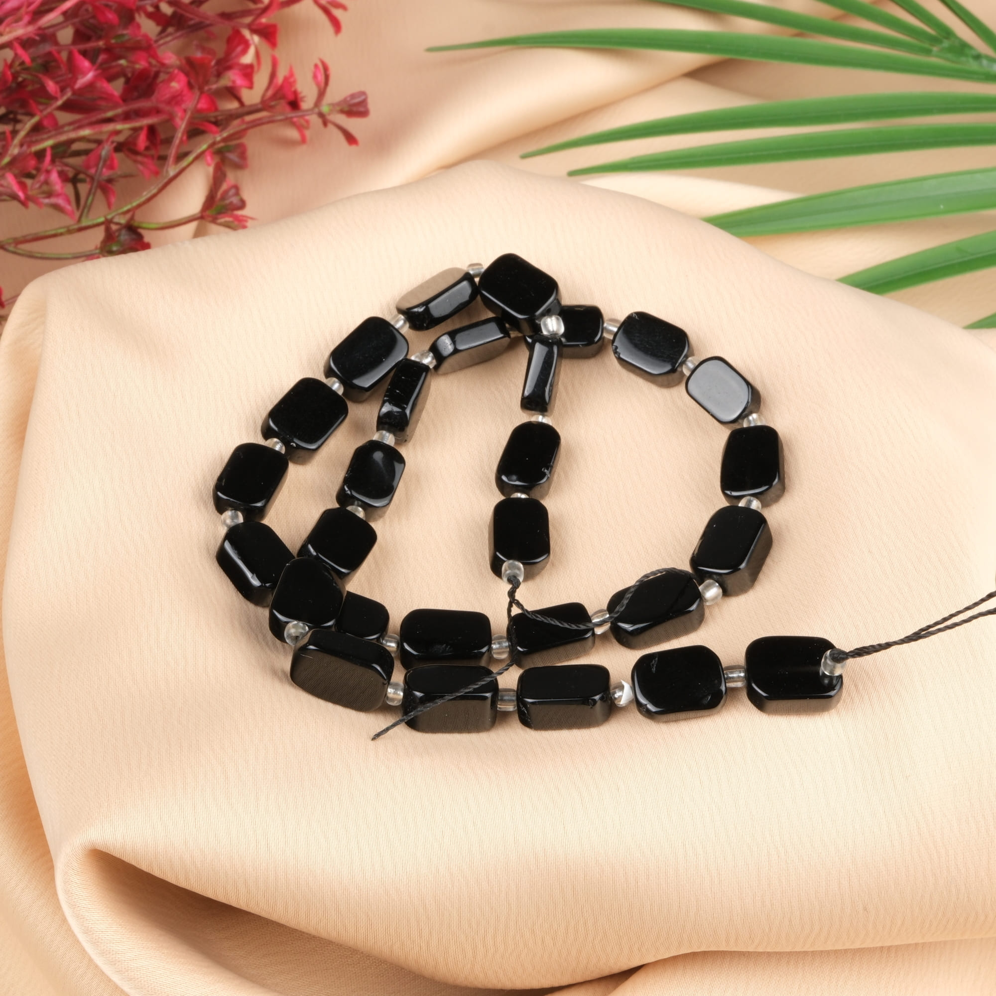 obsidyen-dizi-dogal-tas-dizi-8x12mm-safir-tas-evi-1.jpg Obsidyen Doğal Taş Dizi (8x12mm) - Görsel 1