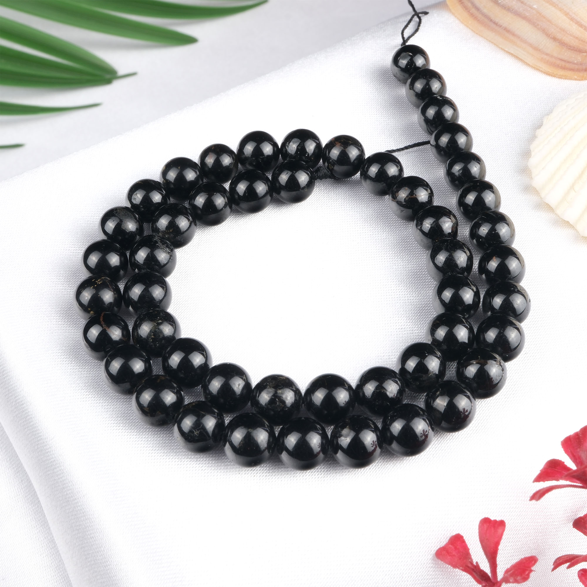 siyah-turmalin-dizi-dogal-tas-dizi-8mm-safir-tas-evi-1.jpg Siyah Turmalin Doğal Taş Dizi (8mm) - Görsel 1