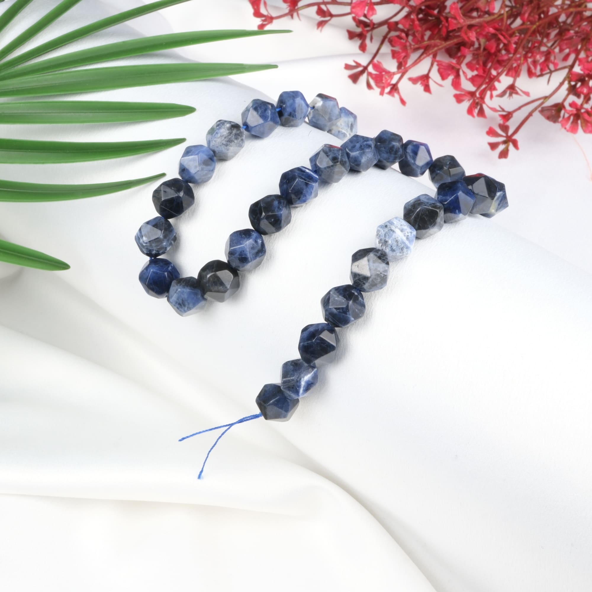 sodalit-kesimli-dizi-dogal-tas-dizi-12mm-safir-tas-evi-2.jpg Sodalit Doğal Taş Kesimli Dizi (12mm) - Görsel 1