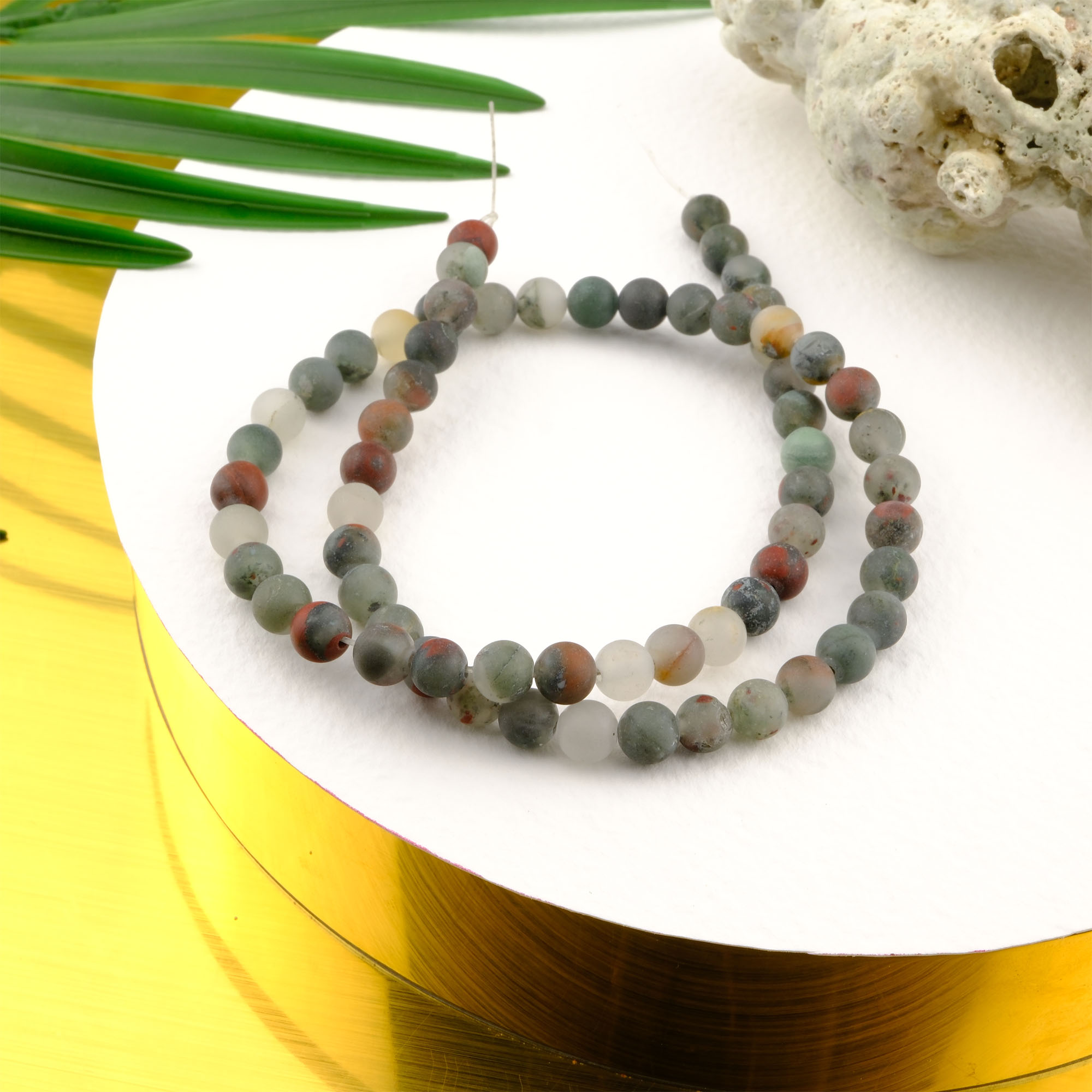 mat-afrika-kantasi-dizi-dogal-tas-dizi-6mm-safir-tas-evi (2) Mat Afrika Kantaşı doğal taş dizi 6mm – kahverengi, krem ve gri tonlarıyla topraklama, denge ve koruma enerjisi sunan toptan doğal taş dizi