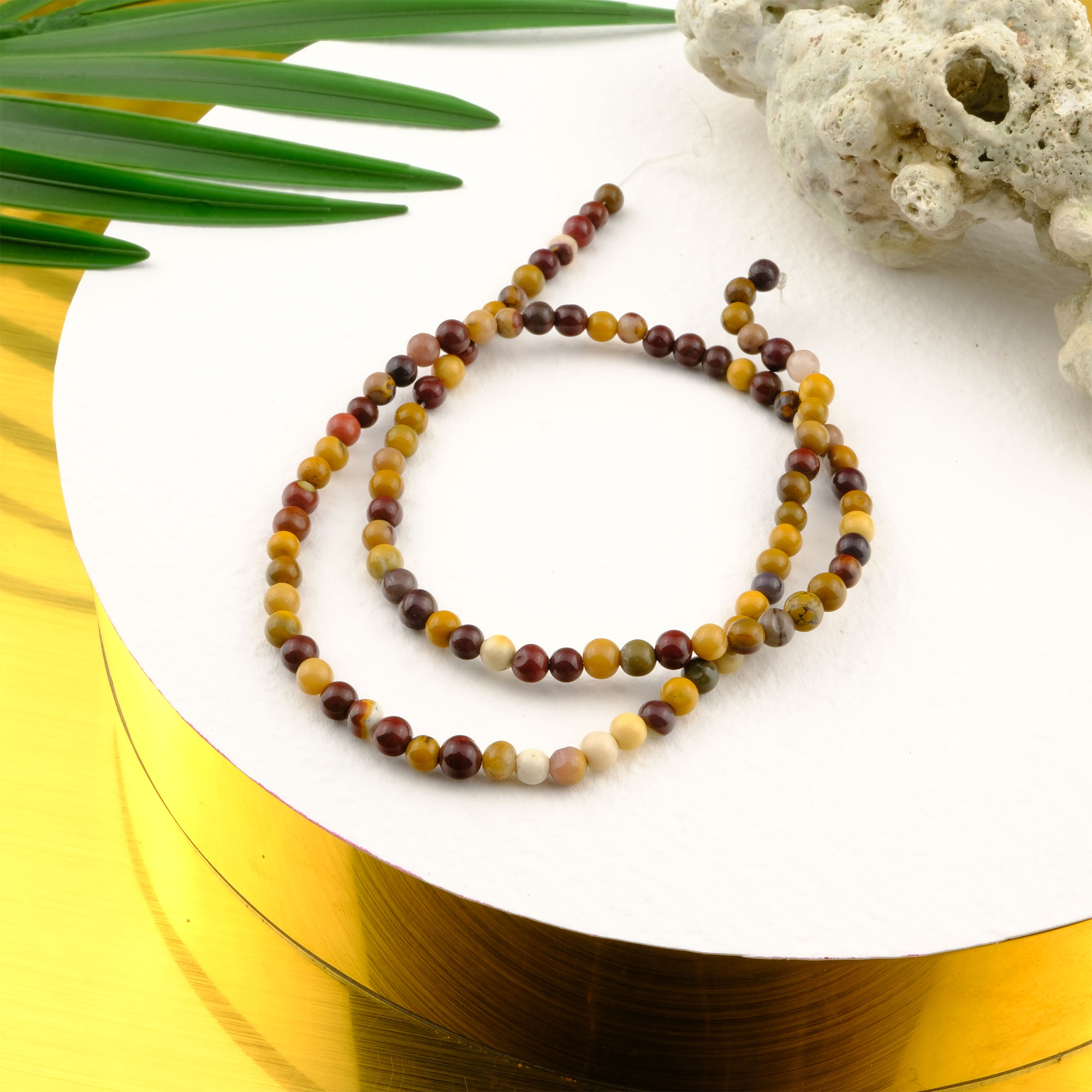 mokait-jasper-dizi-dogal-tas-dizi-4mm-safir-tas-evi- (1) Mokait Jasper doğal taş dizi 4mm – bordo, sarı ve krem tonlarının uyumuyla canlılık ve denge enerjisi sunan toptan doğal taş dizi.