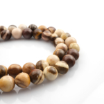 Zebra Jasper doğal taş dizi 8mm – siyah ve beyaz çizgili yapısıyla denge, güç ve odaklanma enerjisi sağlayan toptan doğal taş dizi.