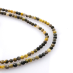 toptan doğal taş dizi bumblebee jasper, 3mm faset kesimli yapısıyla sarı, siyah ve gri tonların güçlü kontrastını sunan, takı üretimi için ideal doğal taş dizi