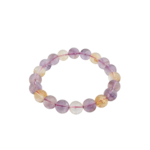 Bracelet flexible en pierre naturelle fait de perles rondes et lisses d'ametrine de 10-11mm montrant des zones de couleur violette et jaune.