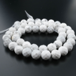 Fil de pierre naturelle de howlite veinée originale taillée facette en taille 8mm préparé pour la conception de bijoux.