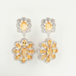 Pendientes de diseño de lujo en plata de ley 925 con piedras de citrina natural de corte facetado en forma de flor.