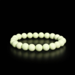 Pulsera flexible de piedra natural hecha de cuentas redondas y lisas de turquesa limon de 8-9mm.