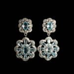 Boucles d'oreilles de luxe en argent sterling 925 ornées de pierres de topaze bleue originales coupe facette en forme de fleur.