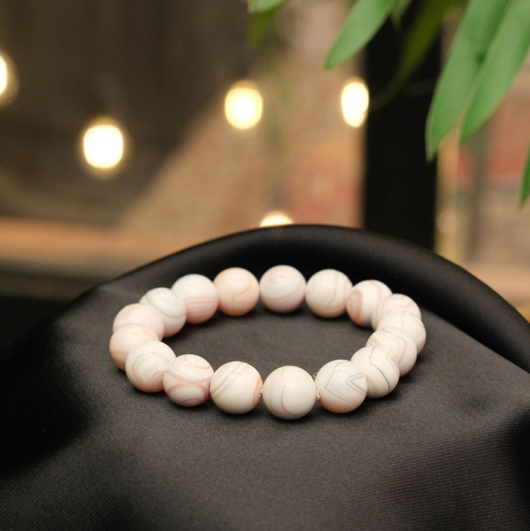 Klassisches Design-Armband aus originalen 12-13mm 7A+ mexikanischen Achat-Natursteinen im glatten Rundperlen-Schliff.