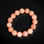Bracciale di design ornato con sfere da 15-16mm di gema di pietra del sole originale 4A+ con sfumature arancioni.