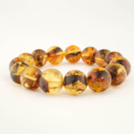 Design-Armband aus originalem 13-14mm baltischen Bernstein-Natursteinen im glatten Rundperlen-Schliff für Erwachsene.