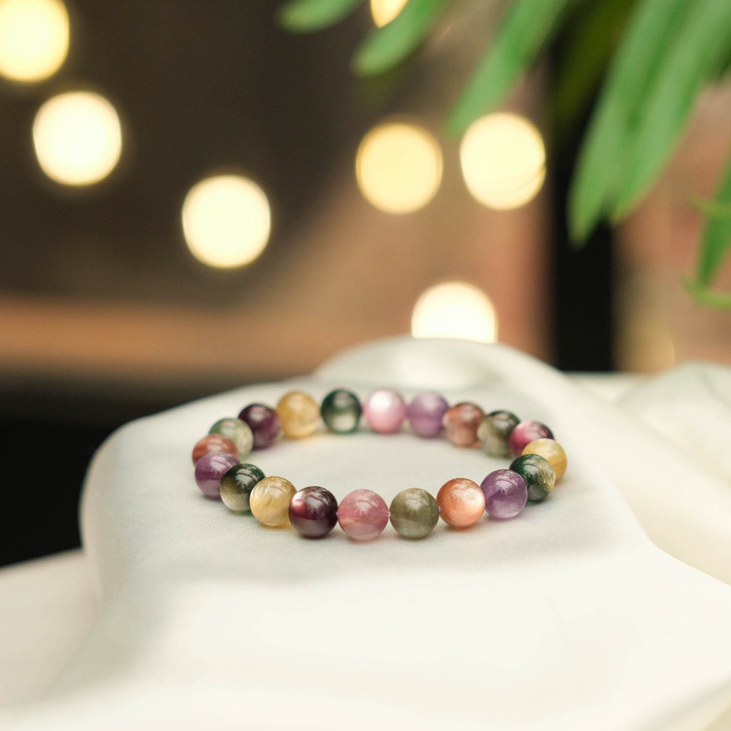 bracelet-luxe-pierre-lepidolite-coloree-naturelle-5a-rondes 9-10 mm pürüzsüz küre kesim lila, pembe, sarı ve yeşil renk geçişli mika pırıltılı 5A+ kalite orijinal renkli lepidolit doğal taş lüks VIP tasarım bileklik modeli.