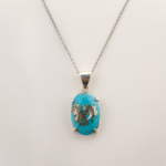 Pendentif de luxe en argent sterling 925 orné d'une pierre turquoise et pyrite naturelle originale de coupe cabochon.