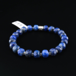 Bracelet en pierre naturelle de lapis-lazuli original bleu foncé à facettes rondelles avec des taches de pyrite dorée.