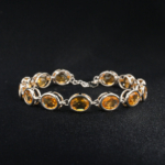 Bracelet rivière de 15+4 cm pour femme en argent 925 orné de pierres de citrine jaune naturelle taille ovale.