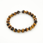 Bracelet élastique en œil de tigre naturel facetté de 8 mm avec perle intercalaire argentée.