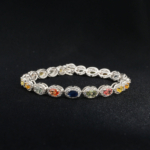 Bracelet rivière de 18 cm pour femme en argent 925 orné de saphirs naturels multicolores taille ovale.