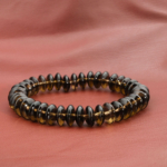 Bracelet élastique en perles rondelles de quartz fumé naturel poli de 10x5 mm.