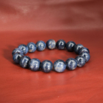 Bracelet élastique unisexe orné de grosses perles rondes en saphir bleu foncé naturel de 12-13 mm.