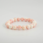 Hochwertiges elastisches Damen-Edelsteinarmband aus echtem rosa Queen-Opal mit 8-9 mm Rundperlen.