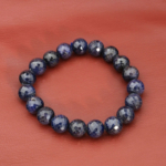 A luxurious 5A+ grade natural dark blue faceted sapphire 10-11mm round gemstone unisex stretch bracelet.