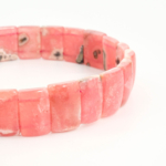 An authentic premium 5A+ grade natural pink rhodochrosite rolex cut stretch bracelet.