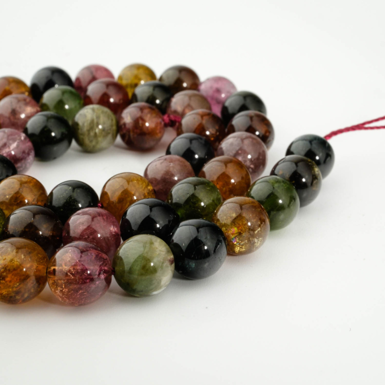A premium 7A grade natural multi-color tourmaline 8mm smooth round gemstone beads strand for jewelry making.