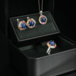 A natural cabochon blue sapphire and colorful faceted sapphire halo gemstone jewelry set in 925 sterling silver.