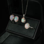 A natural rainbow cabochon opal and colorful faceted sapphire halo gemstone jewelry set in 925 sterling silver.