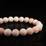 Natural multi-tone pastel pink and white banded queen opal crystal beaded bracelet for women.