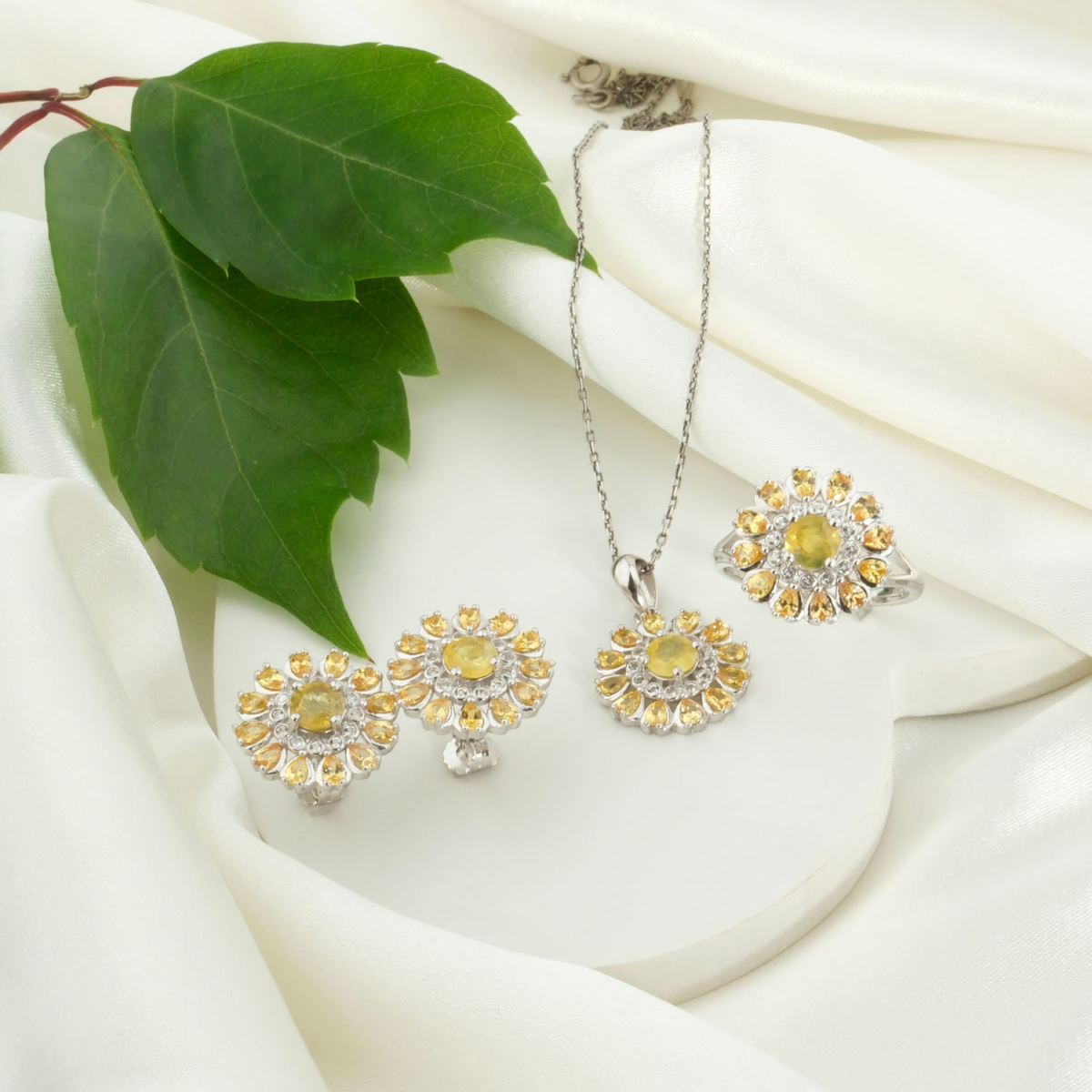 A luxurious 925 sterling silver women's jewelry set featuring sunflower halo natural faceted yellow sapphires.