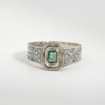 A 925 sterling silver handmade unisex ring featuring a natural square cut Zambian emerald gemstone.