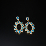 A pair of original London blue topaz natural stone 925 sterling silver gold plated dangle hoop earrings with zircon halo.