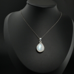 925 sterling silver women design necklace featuring an 11.85ct pear shaped cabochon natural moonstone gemstone.