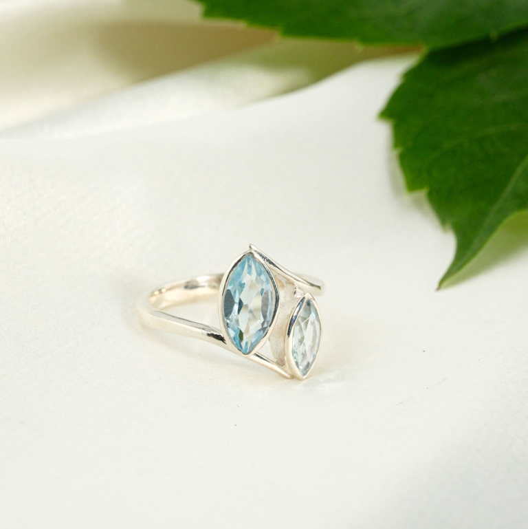 Orijinal ikili markiz faset kesim su mavisi blue topaz taşlı sıvama çerçeveli 925 ayar gümüş kadın yüzük.