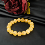 Bracelet artisanal de perles rondes 12-13mm en fluorite jaune doré naturel qualité 6A+.