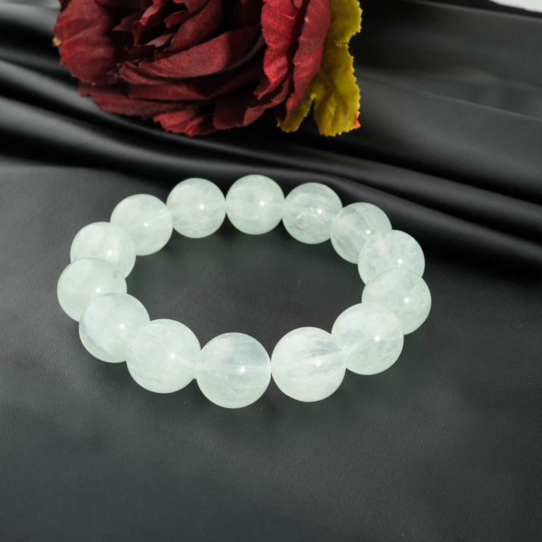 Bracelet artisanal de grosses perles rondes 16-17mm en fluorite vert pastel naturel qualité 5A+.