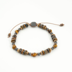 Bracelet artisanal ajustable pour homme et femme en œil de tigre et hématite avec fermoir coulissant.