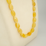 Collier pour adulte en véritable ambre jaune de la Baltique certifié forme navette 55-60cm.