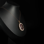 An authentic 32.39ct natural oval amethyst and 5.64ct moonstone halo rose gold plated 925 silver pendant necklace.