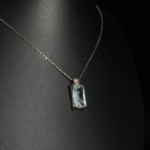 An authentic 6.75ct natural rectangular baguette cut light blue aquamarine gemstone 925 sterling silver pendant.