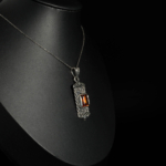 An authentic natural rectangular baguette cut citrine gemstone 925 sterling silver braided pendant necklace.