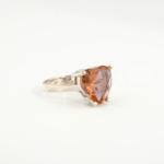 An authentic natural color-change faceted heart-cut zultanite gemstone 925 sterling silver solitaire ring.