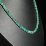An authentic natural graduated faceted rondelle light green emerald gemstone 925 silver necklace.