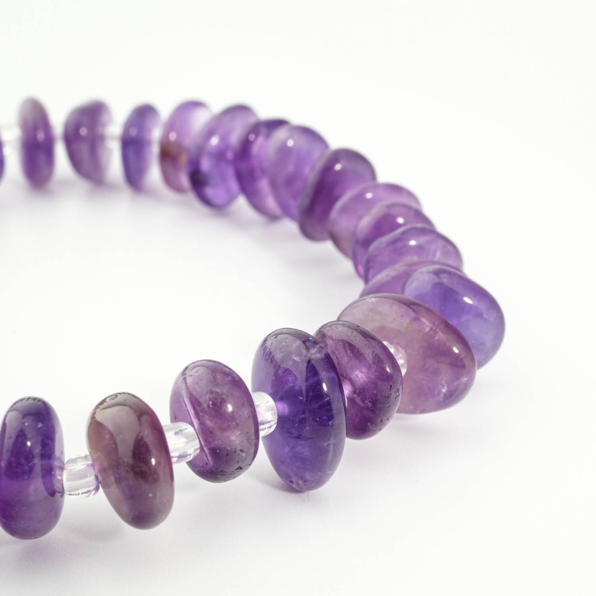 An authentic natural freeform nugget purple amethyst gemstone beaded stretch bracelet.