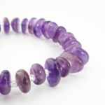 An authentic natural freeform nugget purple amethyst gemstone beaded stretch bracelet.