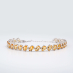An authentic natural faceted oval golden yellow citrine gemstone 925 sterling silver tennis bracelet.