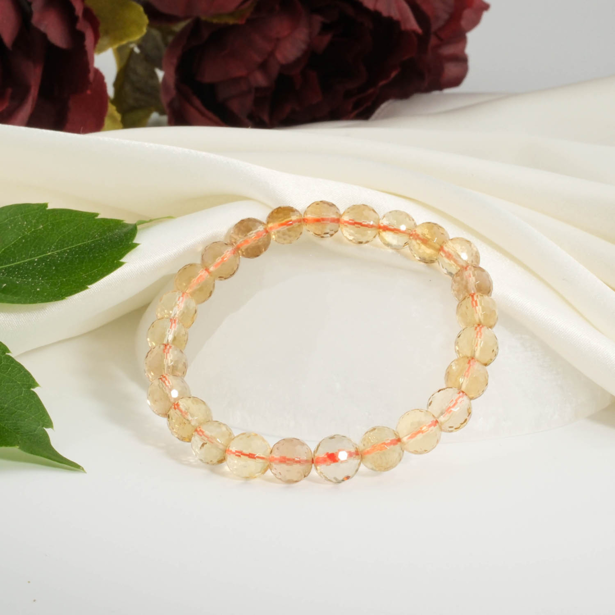 An authentic 7A+ gem grade natural golden yellow faceted citrine gemstone bead bracelet 7-8mm.