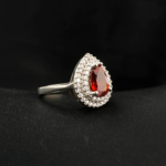 An authentic natural 1.96ct faceted pear-cut orange mandarin garnet gemstone 925 sterling silver double halo ring.